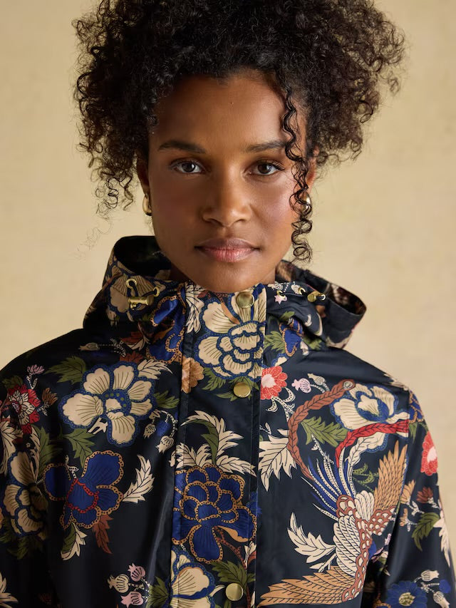 Joules Women’s Holkham Navy Bird Floral Waterproof Packable Raincoat With Hood
